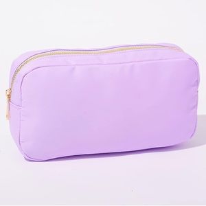 Brand new Medium light purple nylon pouch